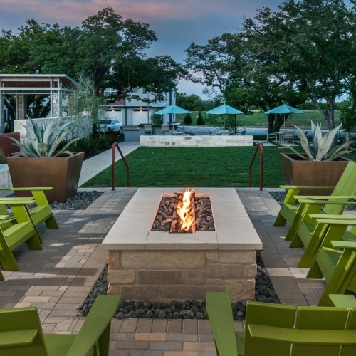 outside firepit with surrounding trees